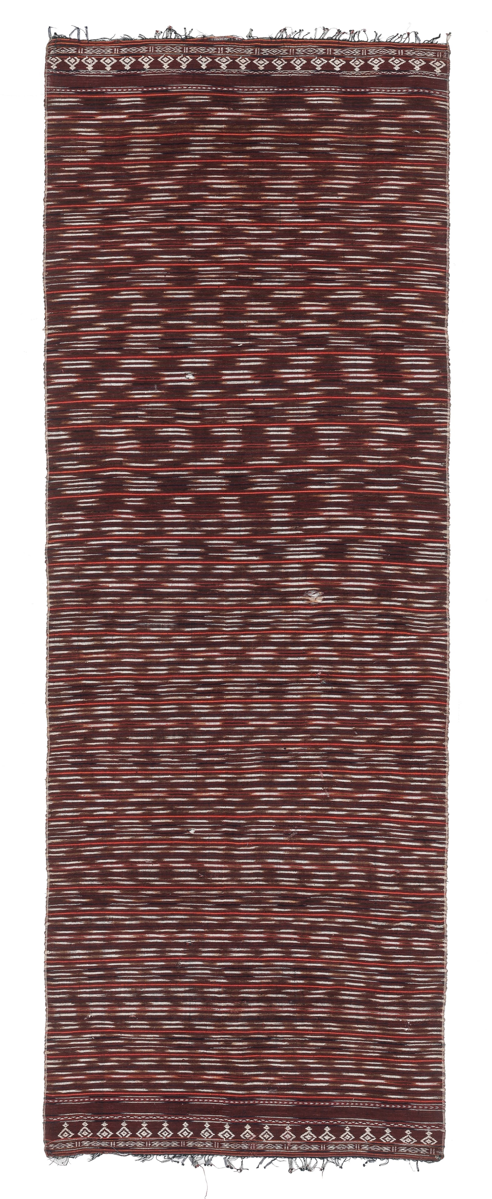 Shoulder Cloth, Pasemah Region, Sumatra, Indonesia, Early 20th C.: Shoulder Cloth, Pasemah Region, Sumatra, Indonesia, Early 20th C. Size: 4'8'' x 1'8'' (142 x 51 cm). Cotton with weft ikat, supplementary weft weave, and lead tassels.