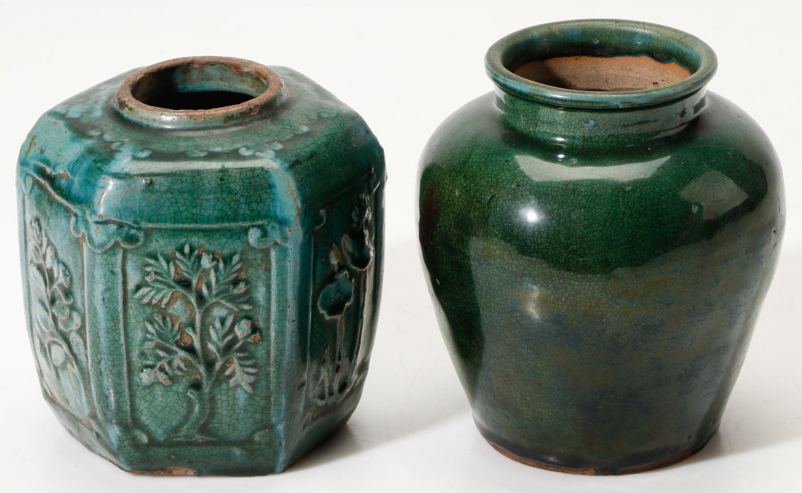 2 Chinese Export War Jars, ex Ashabranner Collection: Group Of 2 Chinese Export War Jars. Including a green-glazed, hexagonal ginger jar decorated with moulded flower motifs. Each Size Approx.: 7'' x 6.5'' x 6.5'' (18 x 17 x 17 cm). Provenance: Ex. Brent
