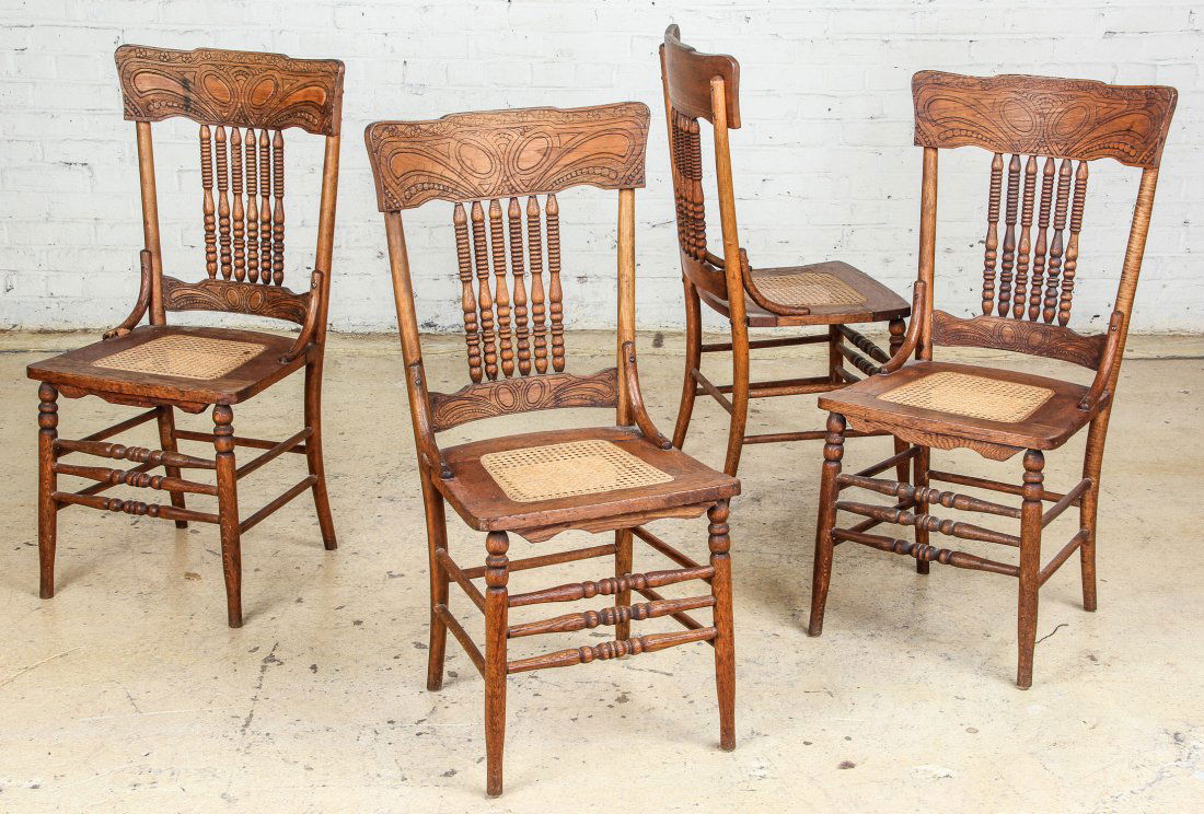 Lot of 4 Antique Oak Pressed Back Spindle Chairs: Lot of 4 Antique Oak Pressed Back Spindle Chairs. Replaced cane seats. Size: 38.5" x 19" x 16.5" , 98 x 49 x 42 cm (each).