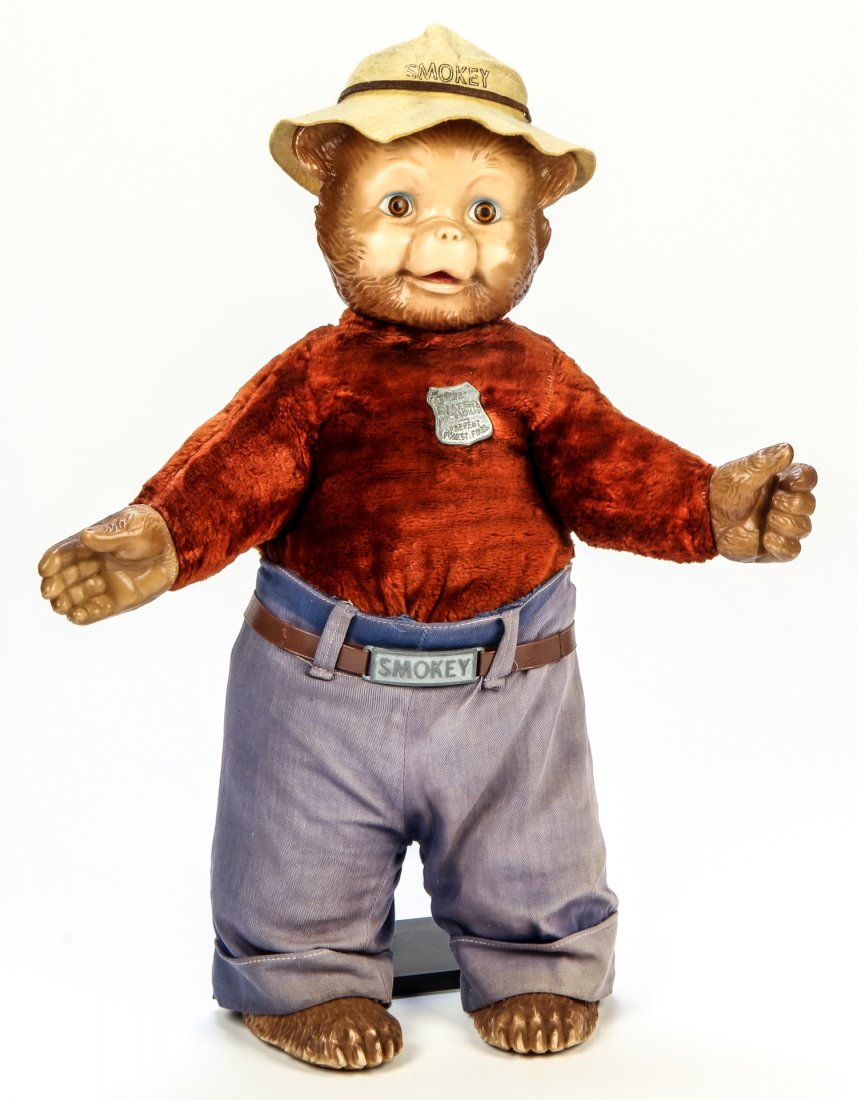 Smokey the Bear. Ideal Toy Corporation. 1953.: Smokey the Bear. Ideal Toy Corporation. 1953. Complete with felt hat, metal buckle and badge. Stamped on nape, " Smokey says: Prevent Forest Fires." Size: 23" x 19" x 4", 59 x 49 x 11 cm.