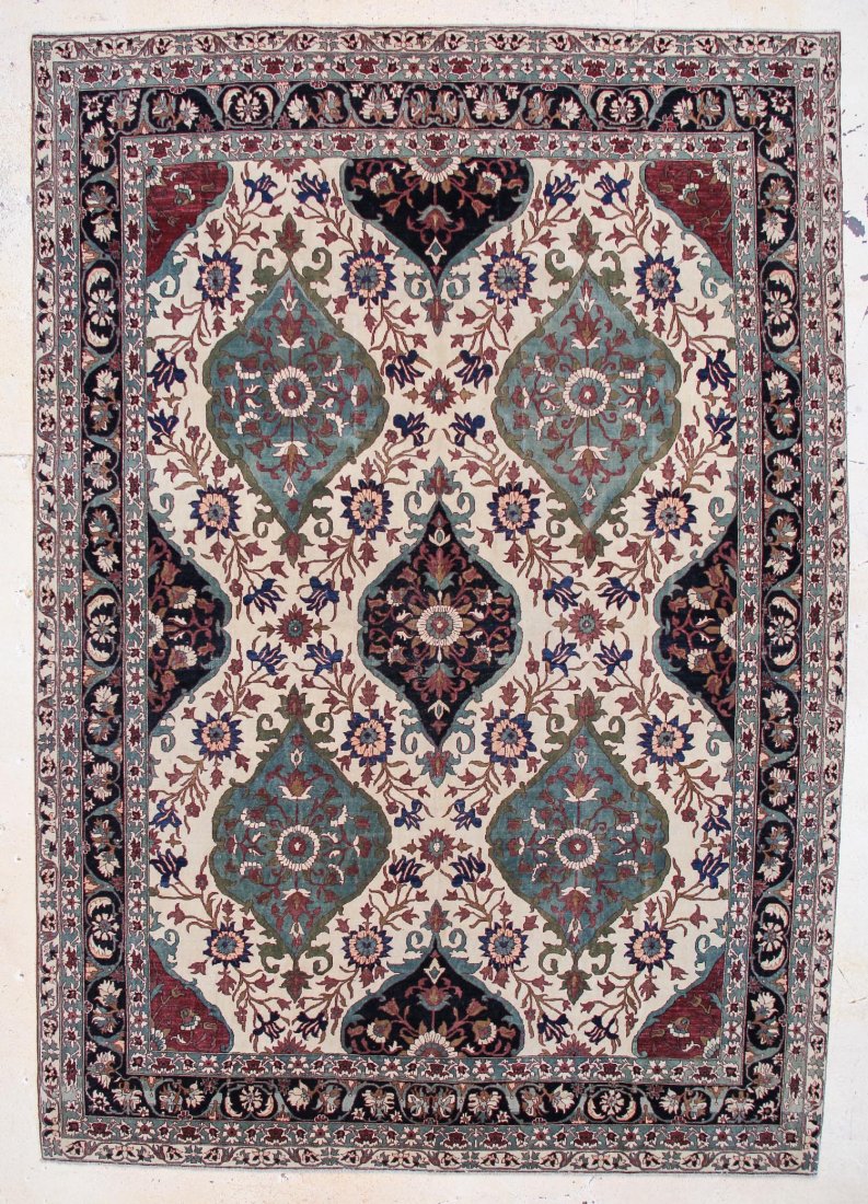 Fine Agra Carpet: 9'11" x 14'2": Fine Agra Carpet, India, floating green and navy medallions on an ivory field; natural dyes. Size: 9'11" x 14'2".