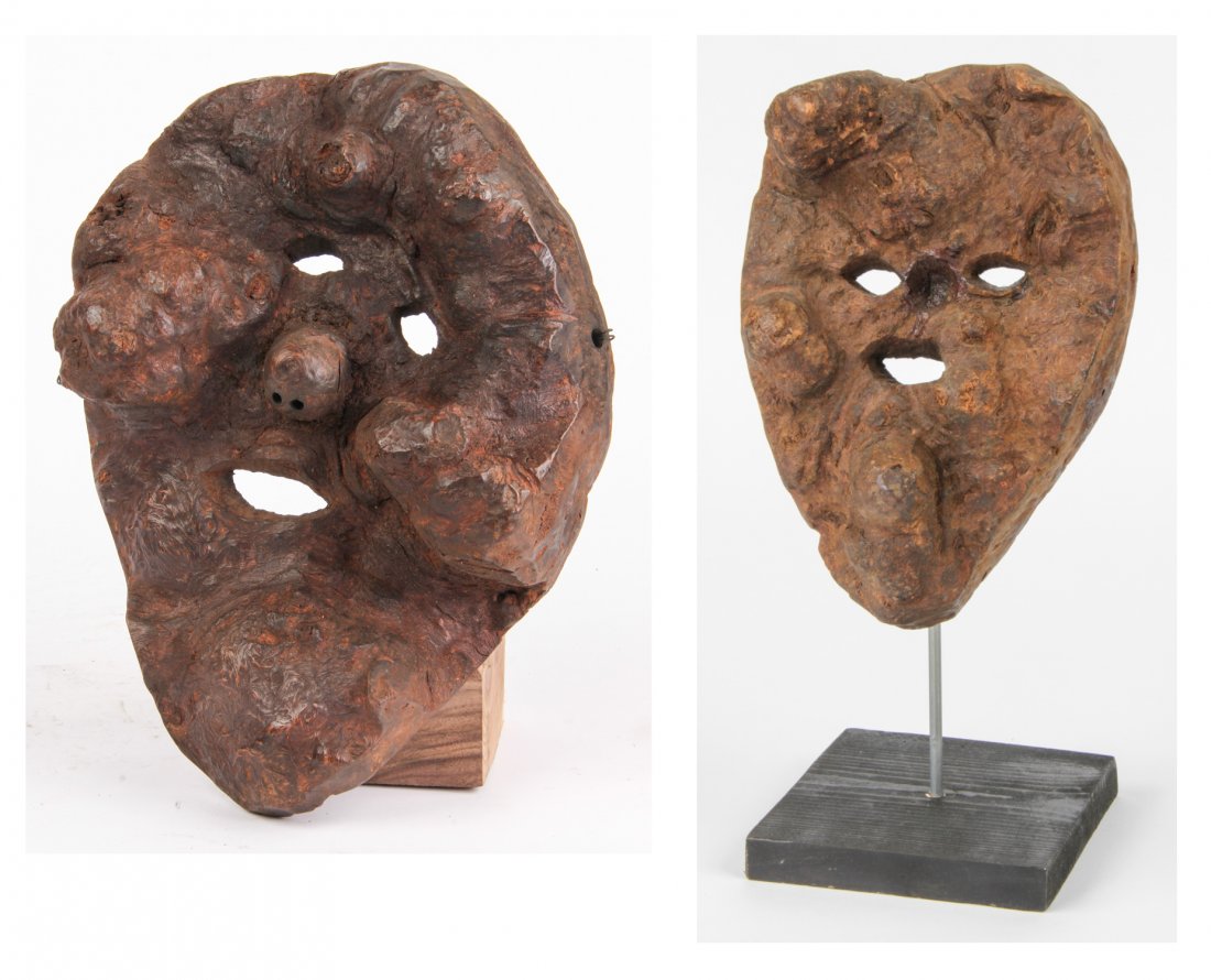 Pair of Nepal Root Wood Masks: Pair of Nepal Root Wood Masks. Sizes:12" x 9" x 3"; 9" x 6" x 4". Provenance: Private East Coast Collection.
