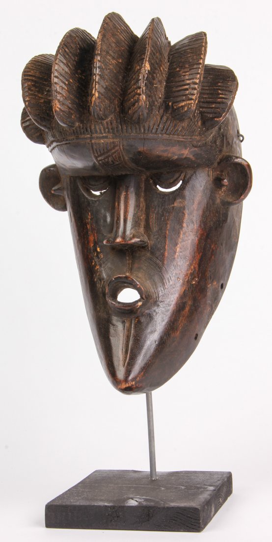 African Bassa Tribe Mask: African Bassa Tribe Mask. Carved wood. Size: 13" x 8" x 6". Provenance: Private East Coast Collection.
