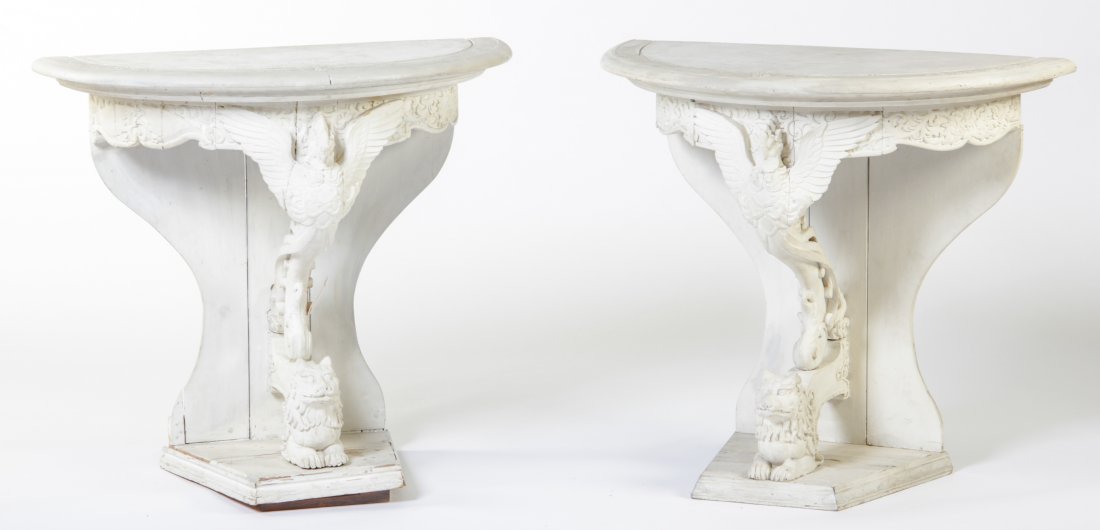 Two Federal Style Demilune Eagle and Lion Consoles: Two Federal Style Demilune Eagle and Lion Console Tables. Classically detailed carved eagles over carved lion brackets. Molded top over carved apron. Painted wood. Size: 32" x 36" x 18" each.