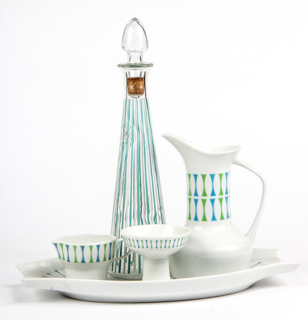 Paul McCobb Mid Century Modern Service: Paul McCobb Mid Century Modern Service. Labeled 4 piece service consisting of an ewer, sugar bowl, creamer and tray. Matched with unrelated period decanter. Size: 16" x 12" x 2" (tray).