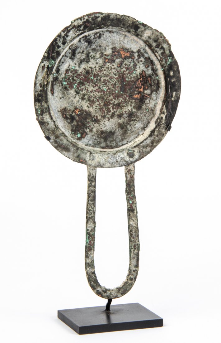 Bronze Patera Dish, Roman: Bronze Patera Dish, Roman, with long curved handle and shallow body, heavy encrustation, 2nd century CE. Size: 10" x 5" x 2.5" (24 x 13 x 6 cm). Provenance: Philadelphia lady.