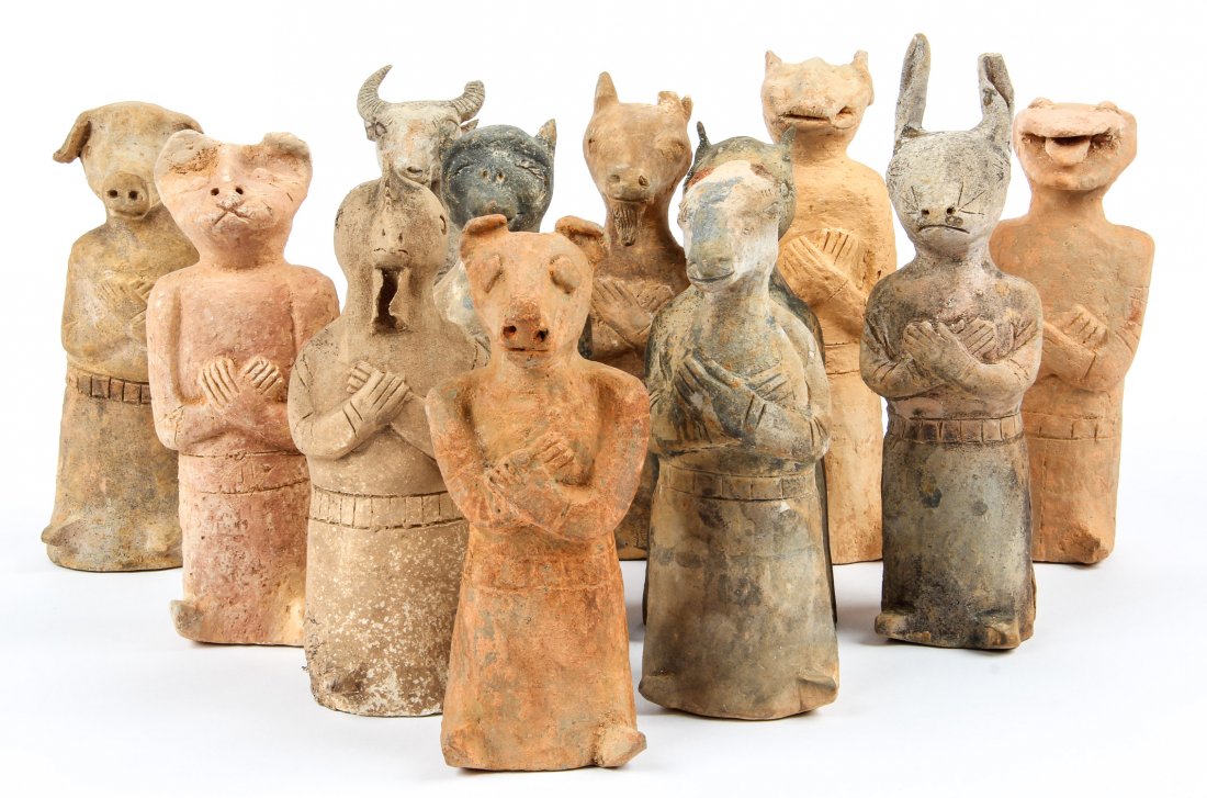 Group of 12 Chinese Ceramic Zodiac Figures, Possibly: Group of 12 Chinese Ceramic Zodiac Figures, Possibly Han Dynasty. Size: 23.5" x 10" x 11" (60 x 25 x 28 cm). Provenance: Pennsylvania collection.