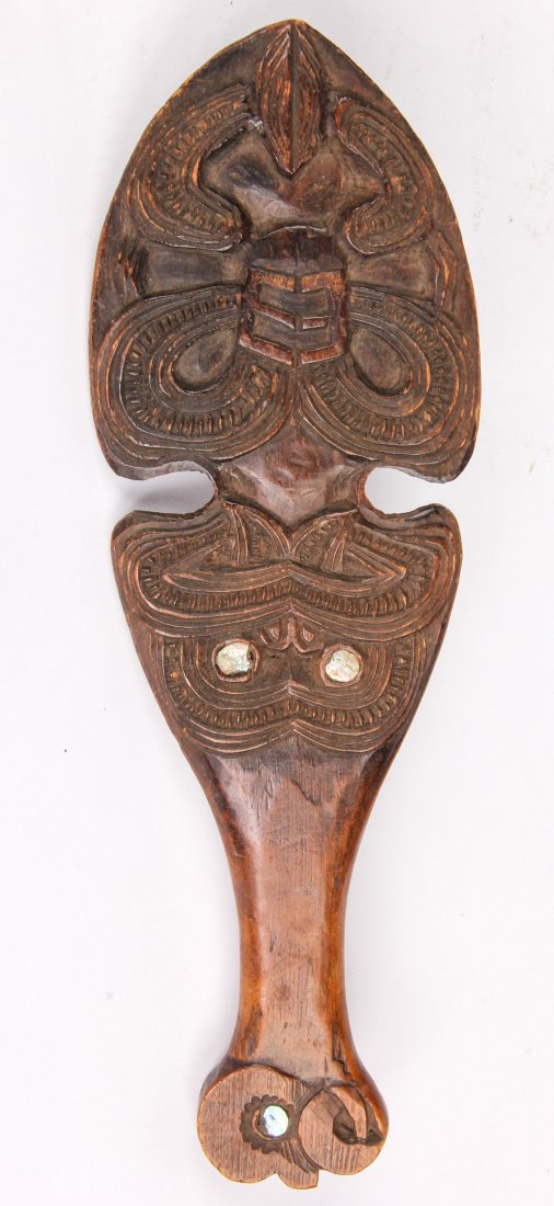 Maori Dance Paddle: Maori light wood dance paddle, carved wood. Height w/ base: 13" (33 cm). Provenance: private California collection.