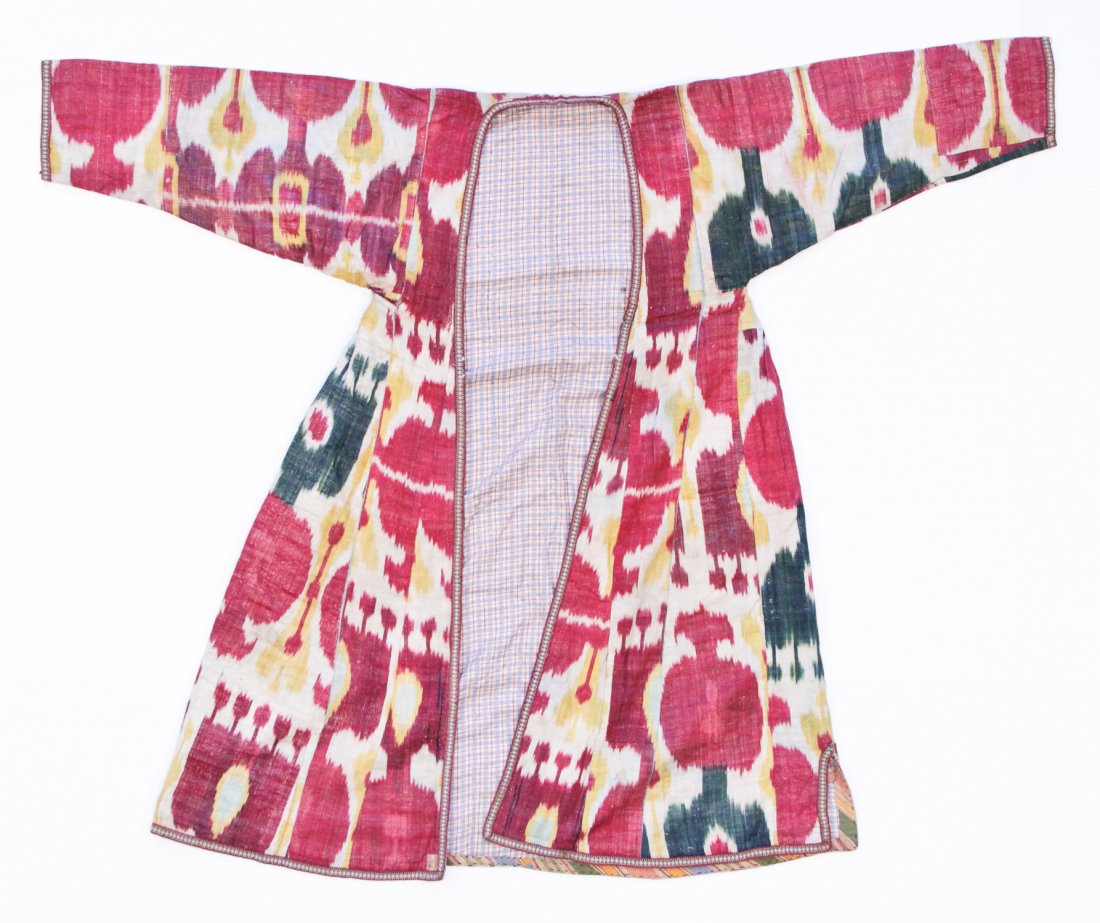 Central Asian Silk Ikat Robe: Central Asian Silk Ikat Robe, Uzbekistan, 19th Century, lined with printed Russian trade cloth. Size: 57" x 47" (144.8 x 119.4 cm). Private New Jersey collection.