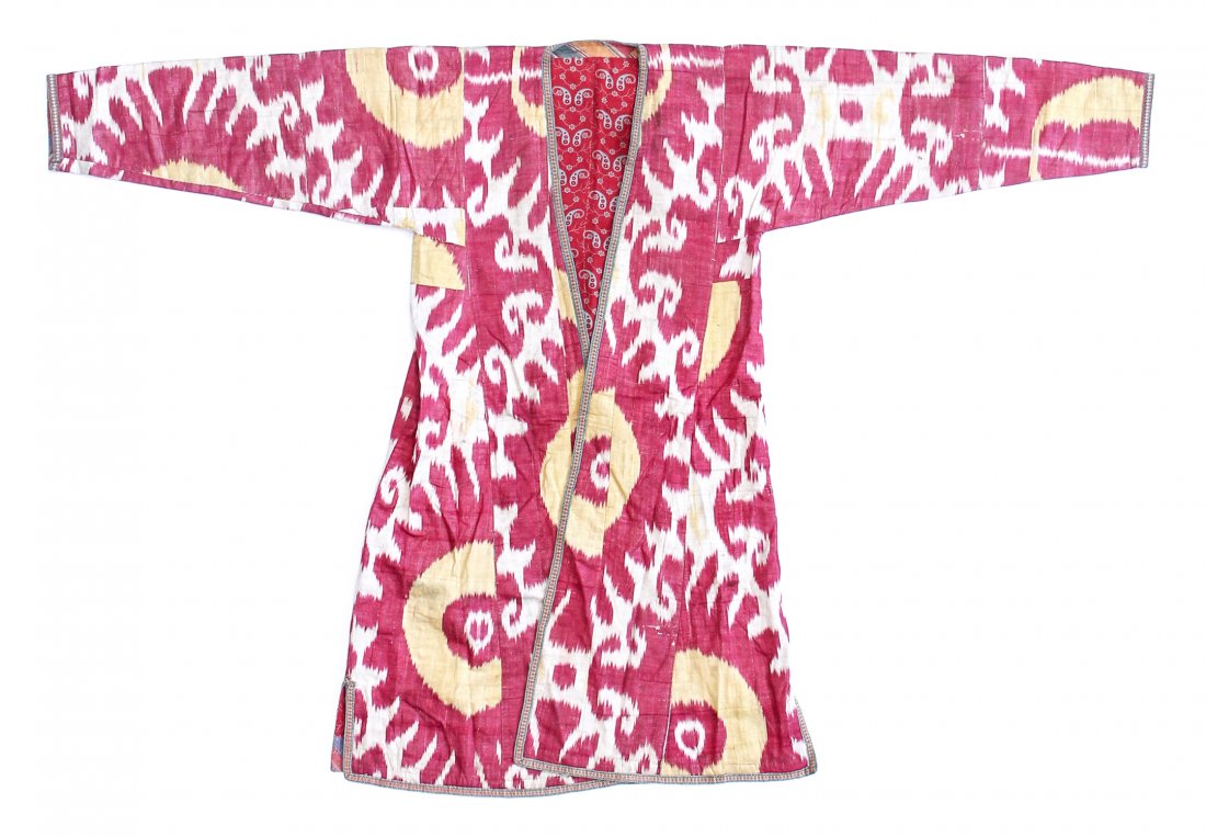 Central Asian Silk Ikat Robe: Central Asian Silk Ikat Robe, Uzbekistan, 19th Century, lined with printed Russian trade cloth. Size: 68" x 47.5" (172.7 x 120.7 cm). Private New Jersey collection.