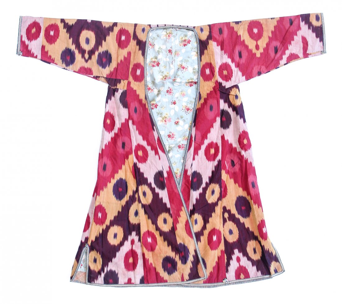 Central Asian Silk Ikat Robe: Central Asian Silk Ikat Robe, Uzbekistan, 19th Century, lined with printed Russian trade cloth. Size: 57.5" x 47" (146.1 x 119.4 cm). Private New Jersey collection.