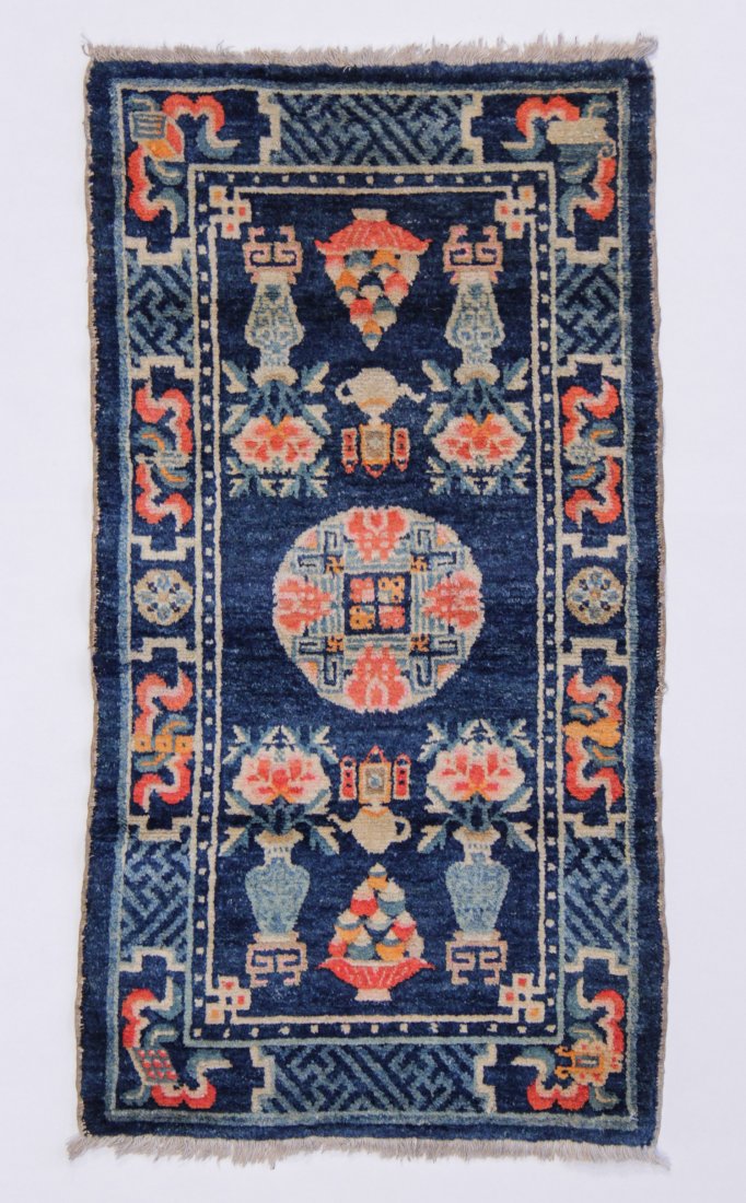 Baotou Rug, Inner Monglia: Baotou rug, Inner Monglia, circa 1900; wool pile on cotton foundation. 1'10" x 3'5" (56 x 104 cm). Provenance: private southwest collection.