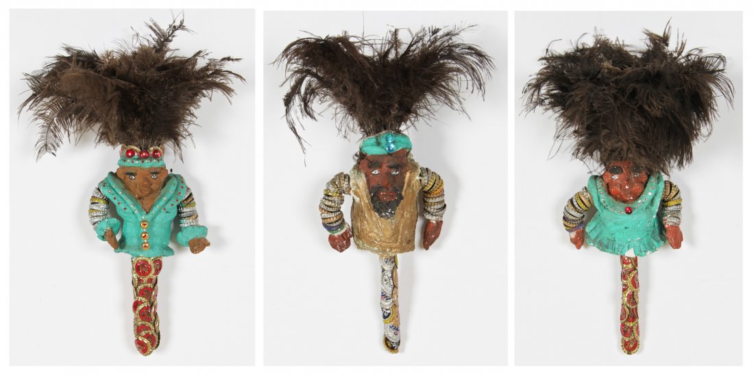 Gregory "Mr. Imagination" Warmack (American, 1948-2012): Gregory "Mr. Imagination" Warmack (American, 1948-2012) Three Feather Plumed Figures, mixed media. Size: 18" x 7" x 4". Under the name of “Mr. Imagination,” Gregory Warmack (1948-2012) saw the unt