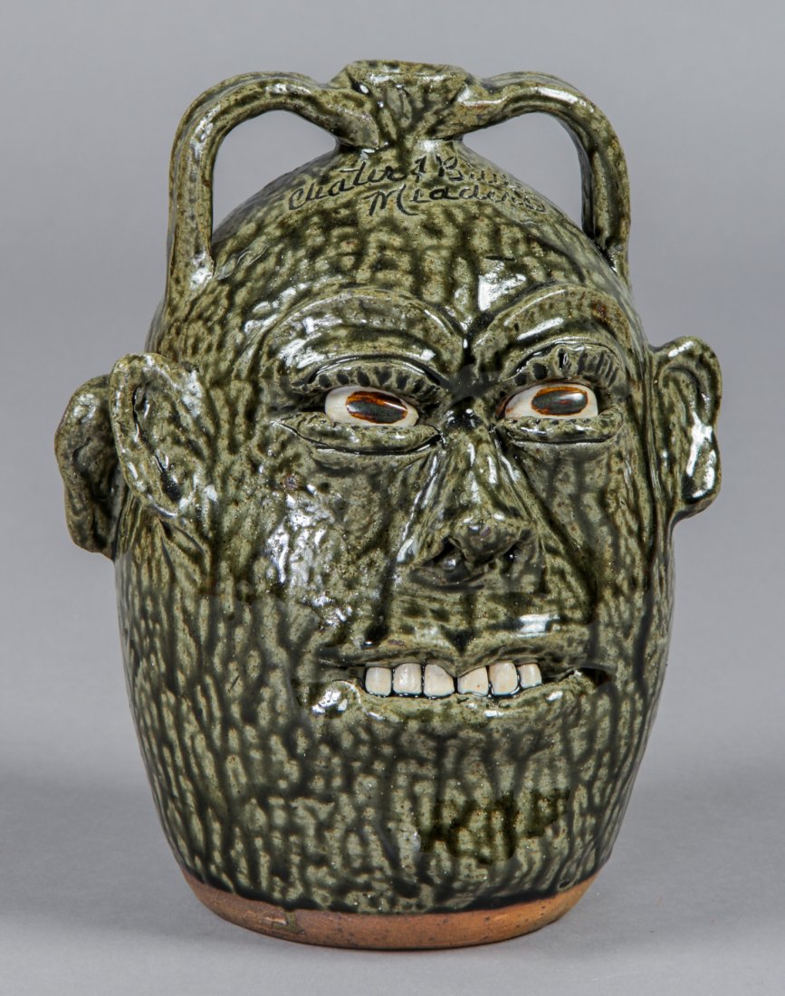 Cleater (USA, 1921-2003) & Billie Meaders, Face Jug: Cleater Meaders (USA, 1921-2003) & Billie Meaders (USA), Face Jug, 1994, glazed ceramic, signed and dated. Size: 10.5" x 8" x 7.5".