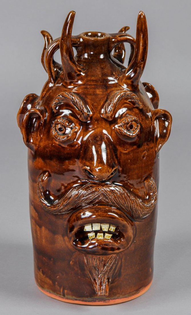 LD Brown (USA) Two Faced Horned Jug: Louis D. Brown (USA), Two Faced Horned Jug, 1995, glazed ceramic, signed and dated. Size: 17.5" x 8.5" x 10".