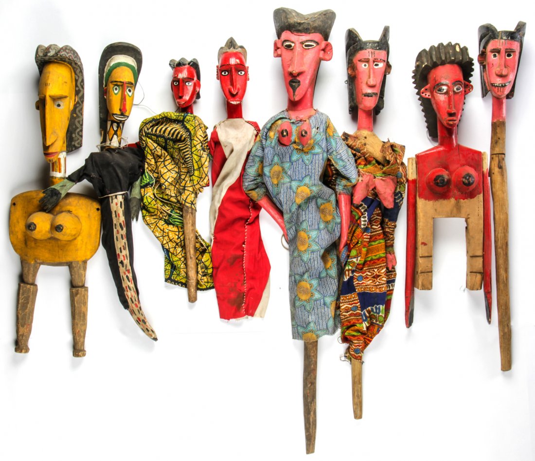 Collection of 8 West African Bobo Puppets: Collection of 8 West African Bobo Puppets, Burkina Faso/Mali, 20th c; carved wood, paint, fabrics. Size: 53" x 7" x 9" (largest).