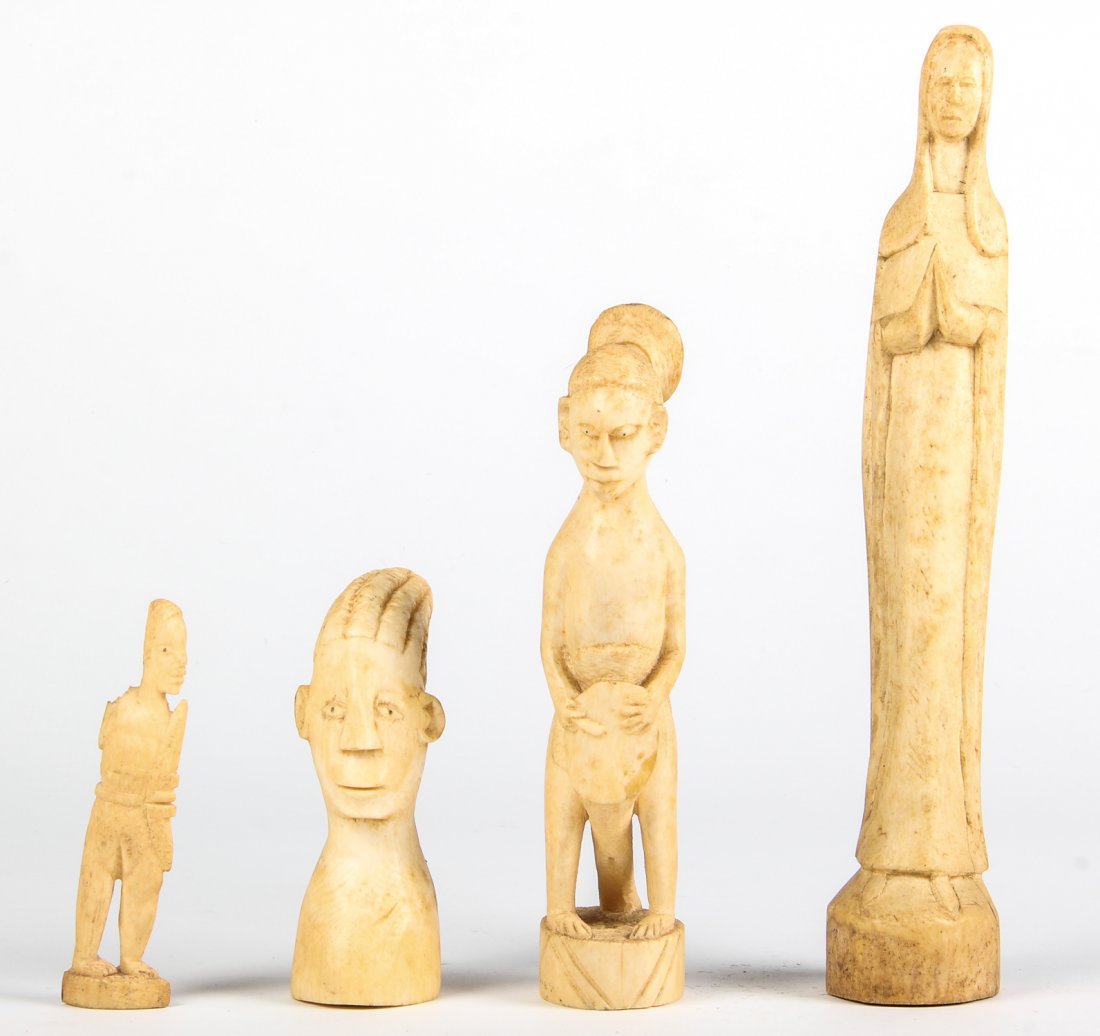 Lot of Antique Carved African Ivory Artifacts: Lot of Antique Carved African Ivory Artifacts. A Madonna figure and 3 effigies. Ranging in size from 4" x 1" x 1" (10 x 3 x 3 cm) to 11" x 2" x 2" (28 x 5 x 5 cm). Provenance: Philadelphia estate.