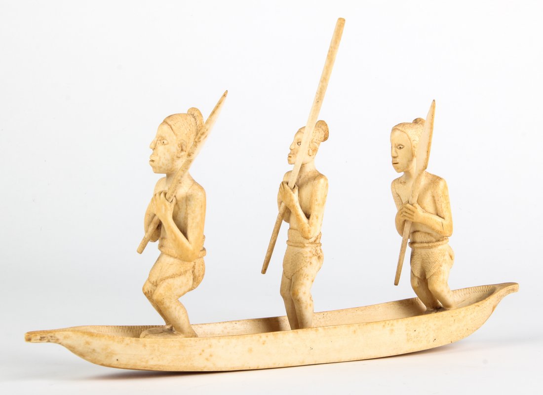 Antique Carved African Ivory Figural Group: Antique Carved African Ivory Figural Group. Boat with boatmen. Size: 9.5" x 16.5" x 5" (24 x 42 x 13 cm). Provenance: Philadelphia estate.