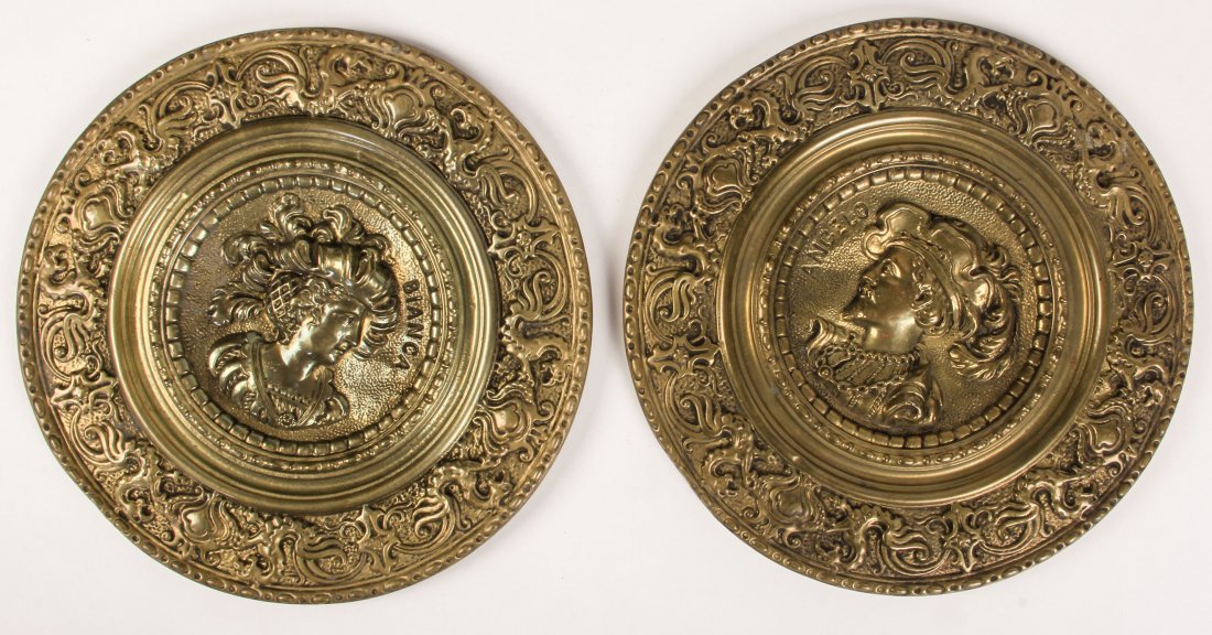 Pair of English Repousse Metal Plates: Pair of English Repousse Metal Plates each with intricate border design, and depicting a man "Angelo" and a woman "Bianca", early 20th C. Size: 12" x 12" x 1", 30 x 30 x 3 cm (each). Provenance: Phila