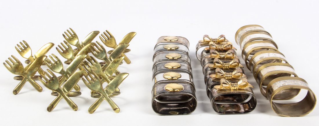 Collection of 28 Silverplate Napkin Rings: Collection of 28 Silverplate Napkin Rings, 20th C. Size: 1" x 2" x 1" (3 x 5 x 3 cm). Provenance: Philadelphia estate.