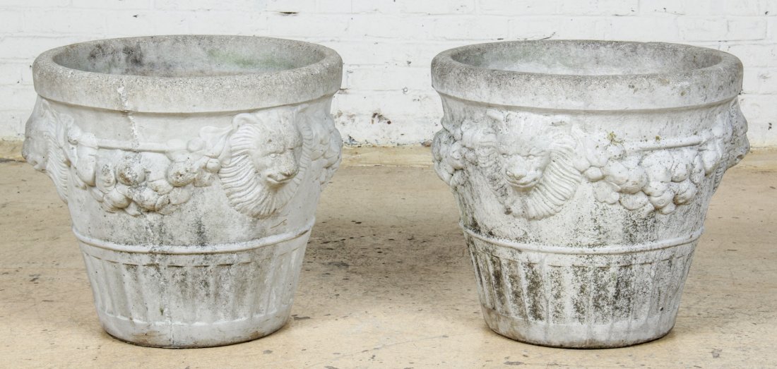 Pair of Cast Concrete Lion Faced planters: Pair of Cast Concrete Lion Faced planters. Size: 20.5" x 22.5" x 22.5", (52 x 57 x 57 cm).