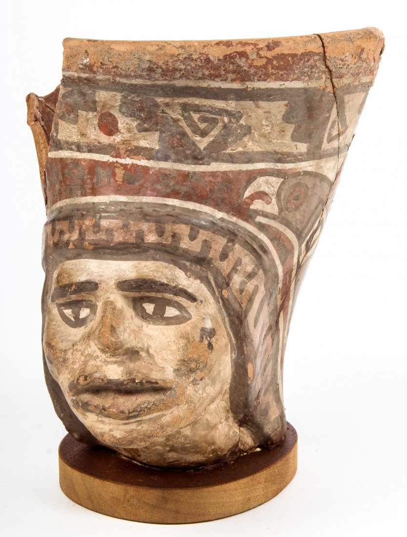 Pre-Colombian Ceramic Figure: Pre-Colombian Ceramic Figure, presumably 500-1200 AD, on wooden base, losses. Size: 11" x 7" x 8" (28 x 18 x 20 cm). Provenance: Philadelphia estate.