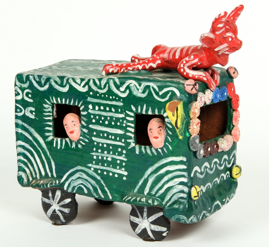 Mexican Ceramic Folk Art Sculpture of Devil Atop a Bus: Mexican Ceramic Folk Art Sculpture of Devil Atop a Bus. Unsigned. Painted and glazed terra cotta. Size: 10.5" x 6" x 12" (27 x 15 x 30 cm).