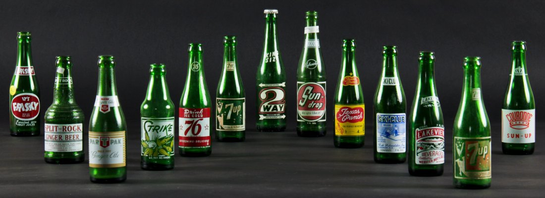 13 Vintage Glass Bottles, various sizes: 13 Rare Vintage Glass Bottles, various sizes. Including: It's Frisky, Split-Rock Ginger Beer, Par T Pak, Strike, 76, 7up, 2 Way King Size, Sun-drop, Texas Punch, Ski-Club, Lakeview, 7up, Couronne Sun-