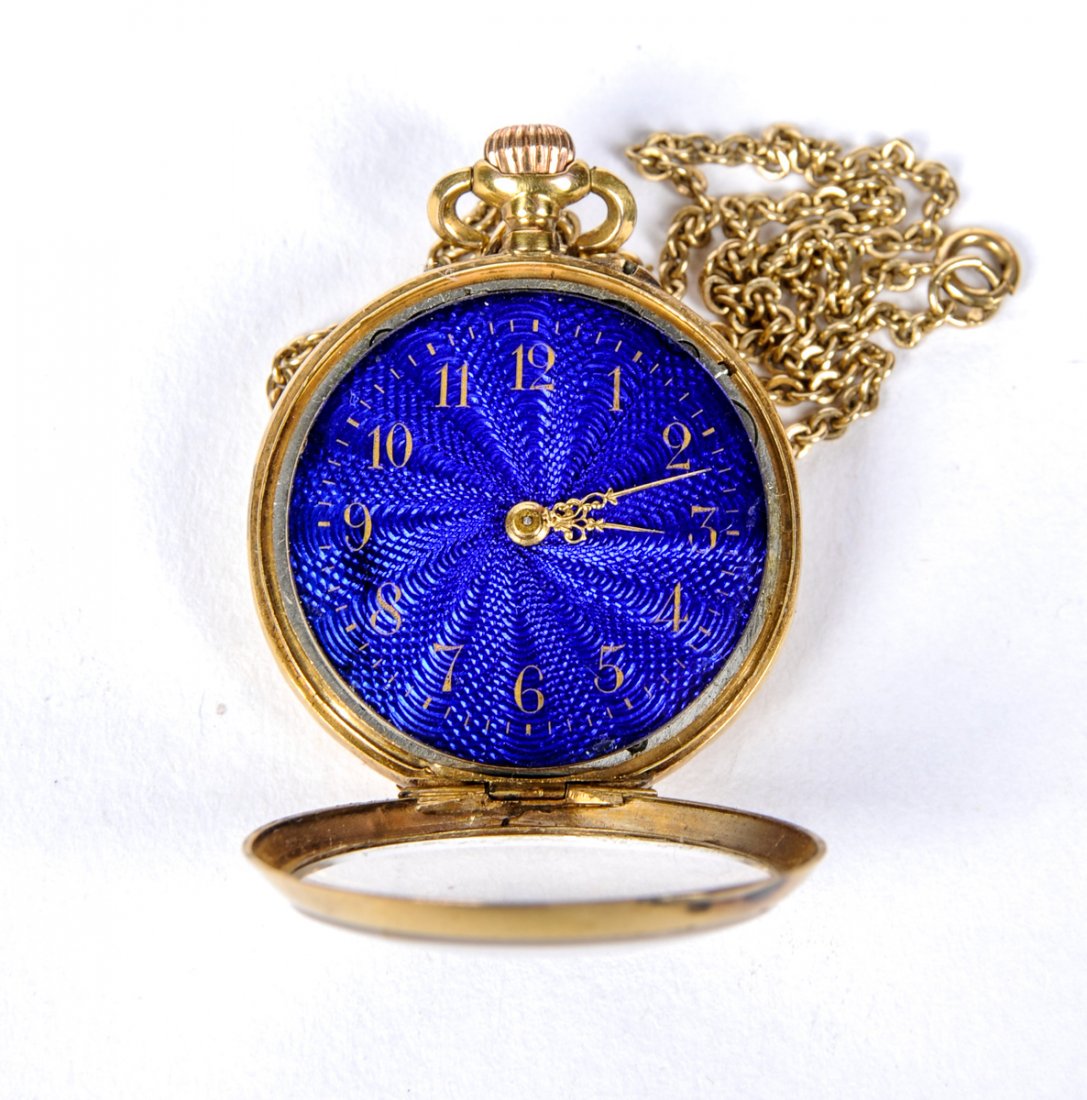 Antique Swiss Made Ladies Pocket Watch: Antique Swiss Made Ladies Pocket Watch. Size: 1", 3 cm d. (case), 10.5", 27 cm (total length with chain). Kristina Barbara Johnson Estate, Princeton, New Jersey. A portion of auction proceeds to benef