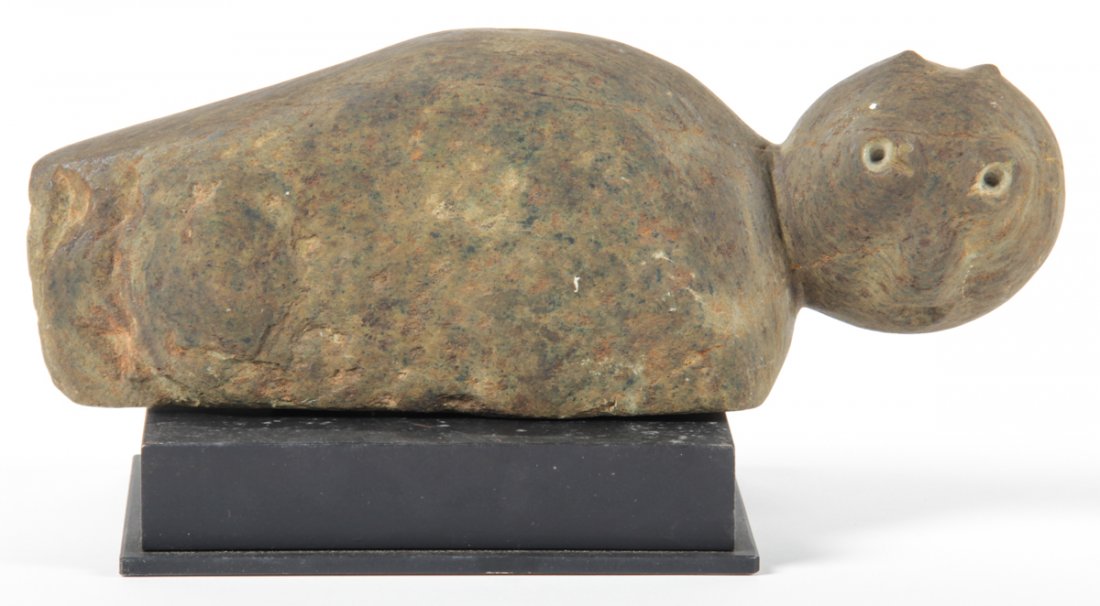 Raymond Coins (American, 1904-1998): Raymond Coins (American, 1904-1998), carved river stone Cat in horizontal position. Size: 5" x 13" x 2" (13 x 33 x 5 cm). Kristina Barbara Johnson Estate, Princeton, New Jersey. A portion of auction p