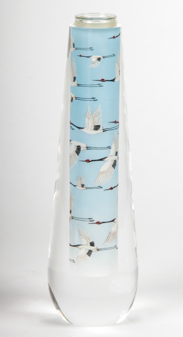 Archelan Reverse Painted Crystal Vase: Archelan Reverse painted crystal vase featuring snow cranes. Dated 2005. Size: 10" x 2.5" d. (25 x 6 cm). Kristina Barbara Johnson Estate, Princeton, New Jersey. A portion of auction proceeds to benef
