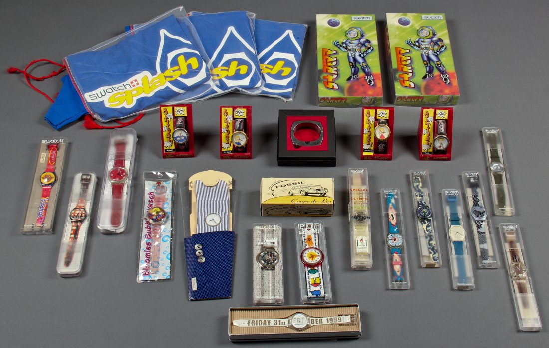 Group of Watches: 23 Swatch and Other Watches in Original Boxes including 3 Swatch T-Shirts (XL).