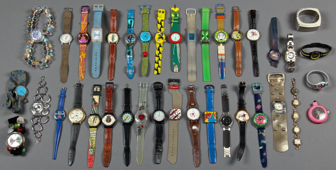 Collector's Lot of 38 Watches: Collector's Lot of 38 Watches including Swatch, Timex, Fossil and Vendome.