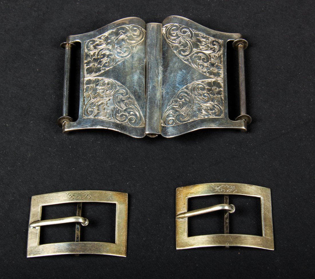 Estate Lot of Sterling Buckles.: Estate lot of sterling silver buckles. A Sterling buckle marked Sterling 1.20 ozt. #2922 Hallmarked Wm. B. Kerr & Co. And Antique Silver buckles marked Sterling 3778 Engraved script with initials 0.31
