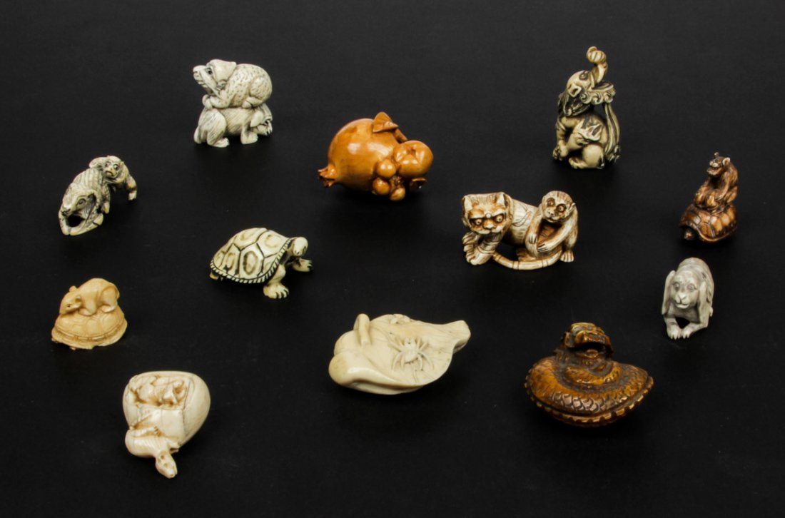 12 Pc Lot of Antique Japanese Ivory Netsukes: 12 pc lot of Antique Japanese ivory netsukes in fabled animal forms. Including dragons, dogs, turtles, rats and spiders. Size: largest 2" (5 cm).