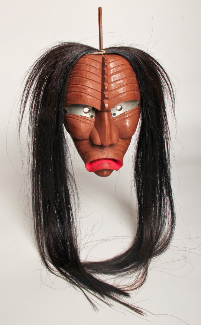 Iroquois False Face Mask: Iroquois False Face Mask, carved and painted wood with horsehair, 20th c. Size: 9.5" x 7" x 5" (24 x 18 x 13 cm).