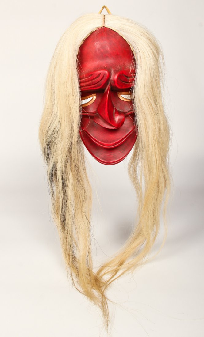 Iroquois False Face Mask: Iroquois False Face Mask, carved and painted wood with horsehair, 20th c. Size: 12" x 6.25" x 5" (30 x 16 x 13 cm).