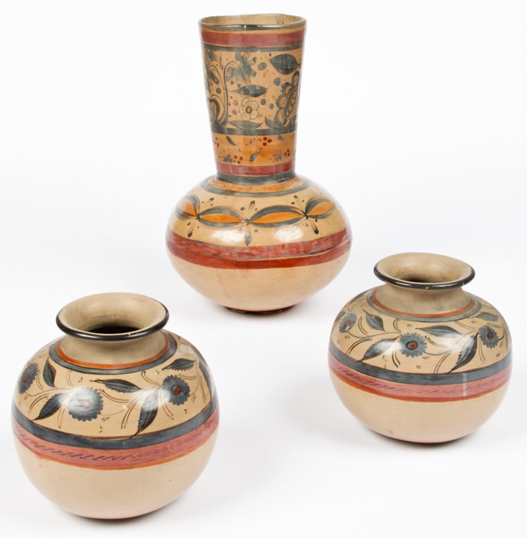 3 pc Antique Tonala Pottery Garniture: 3 pc Antique Tonala Pottery Garniture. One tall vessel bearing an illegible workshop stamp with a pair of olla pots. Size: tallest 15.5" x 9.5" diameter (39 x 24 cm). Provenance: Private Philadelphia 