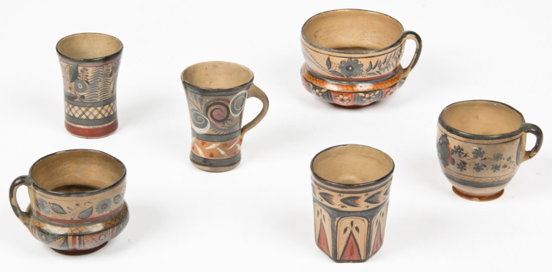 6 Mexican Tonala Pottery Vessels.: 6 Tonala pottery vessels. Early 20th C. Mexican. Consisting of 2 beakers and 4 single handled pots. Size: largest 4" x 5.5" diameter (10 x 14 cm). Provenance: Private Philadelphia collection.