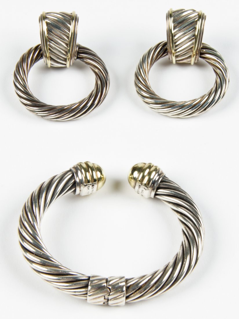 David Yurman Earrings and Bracelet Suite: David Yurman earrings and bracelet suite. Size: earrings 2.25" x 1.75", 6 x 4 cm (earrings), 2.5" x 3", 6 x 8 cm (bracelet).