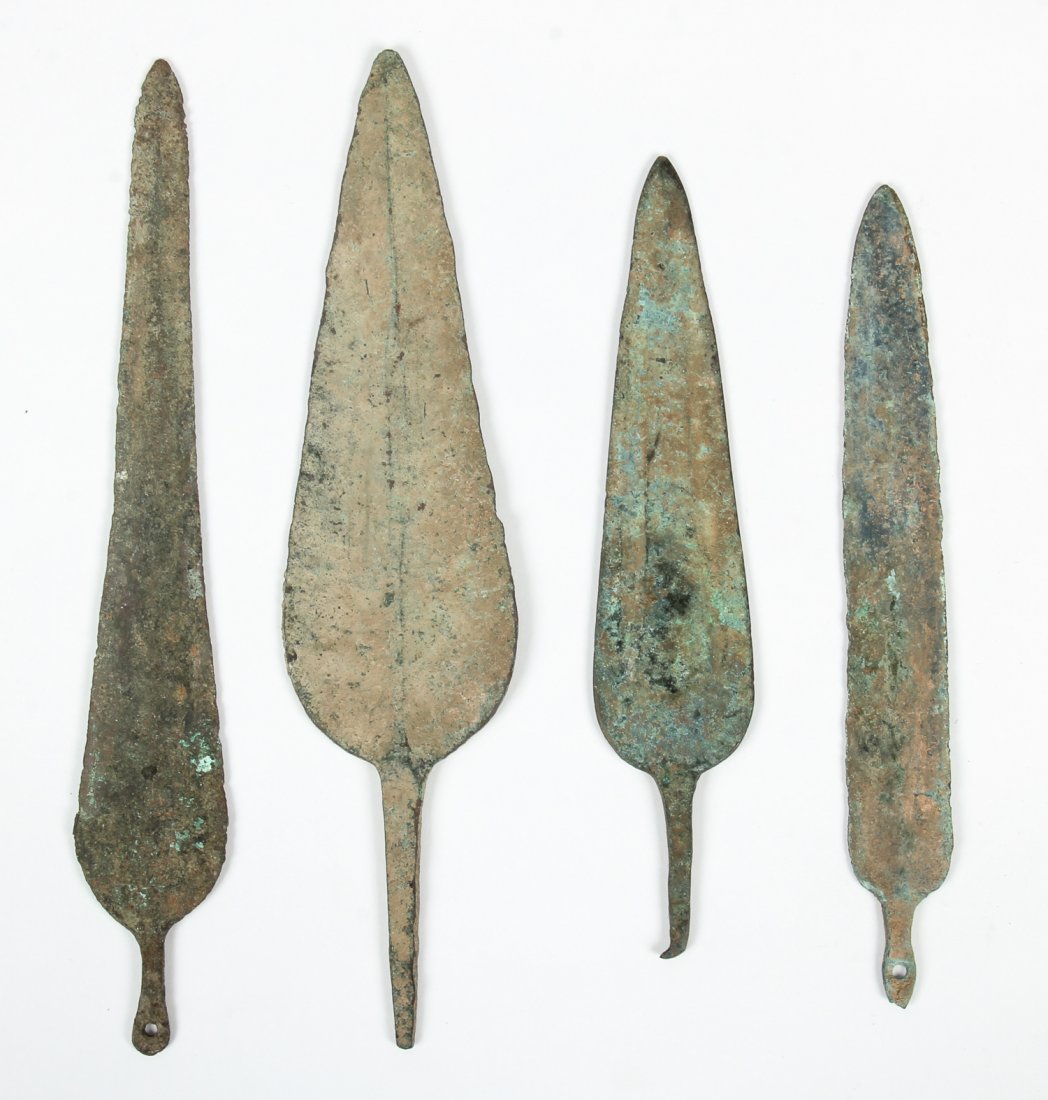 4 Ancient Near Eastern Bronze Spear Heads: 4 Ancient Near Eastern Bronze Spear Heads. Size: largest 10.75 x 2.75" (27 x 7 cm). ex: Arthur M Sackler Collection, Millea Bros.