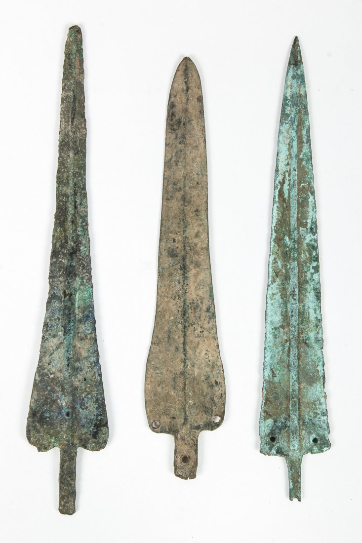 3 Ancient Near Eastern Bronze Spear Heads: 3 Ancient Near Eastern Bronze Spear Heads. Size: longest 10.5" x 2" (27 x 5 cm). ex: Arthur M Sackler Collection, Millea Bros.