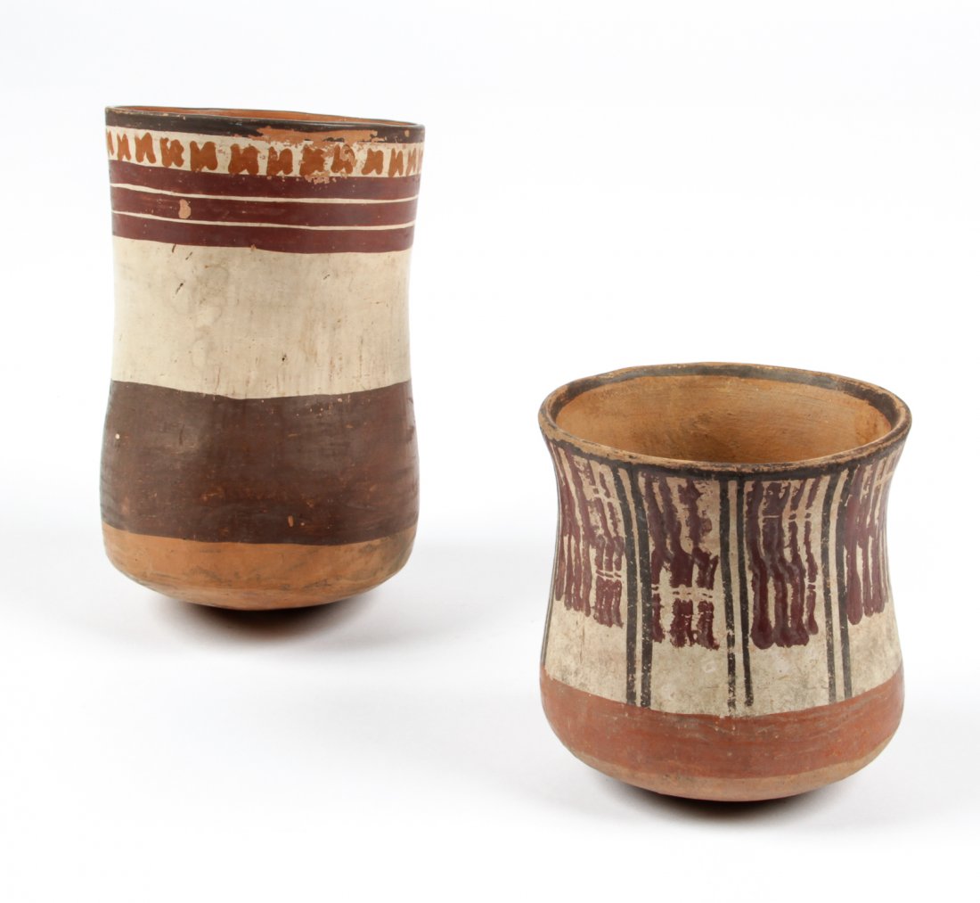 2 Pre-Columbian Polychrome Decorated Ceramic Beakers: Two Pre-Columbian Polychrome Decorated Ceramic Beakers. Size: 4" x 4" x 4" (10 x 10 x 10 cm), and 6.5" x 4" x 4" (17 x 10 x 10 cm). ex: Arthur M Sackler Collection, Millea Bros.