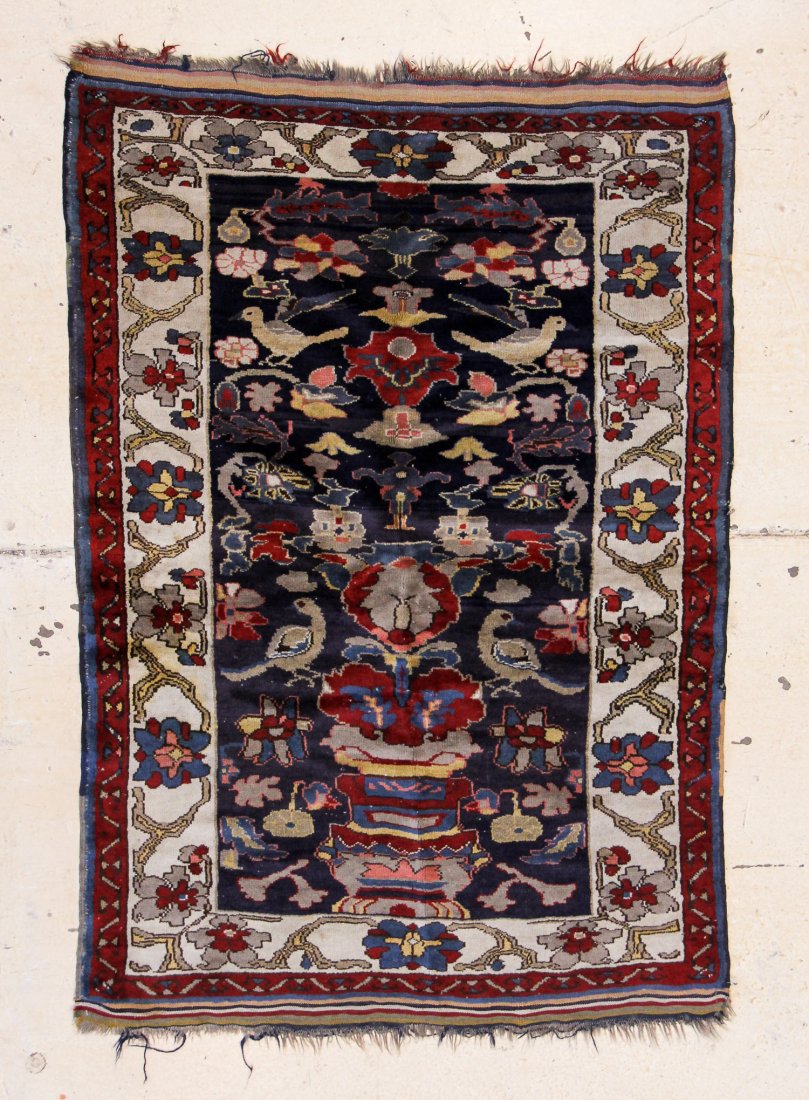 Central Asian Rug: 3'9" x 5'1": Central Asian Rug, early 20th c. Size: 3'9" x 5'6" (114 x 168 cm).