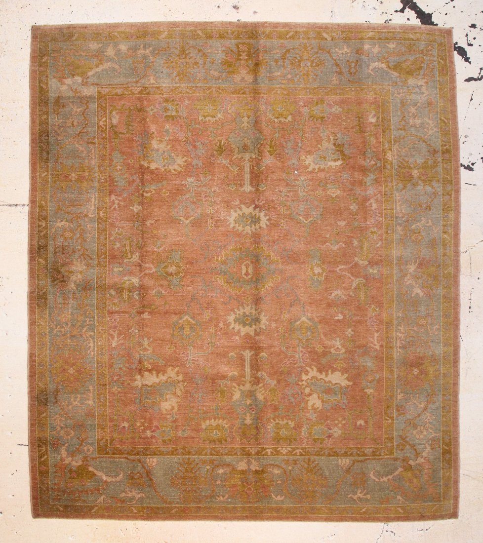 Oushak Rug: Oushak Rug, Turkey, 20th c. areas of moderate wear, several small repairs. Size: 9' x 10'6" (274 x 320 cm).