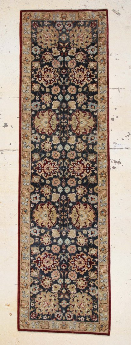 Agra Rug: 3'4" x 11'9": Agra rug, India, 20th c., shows wear. Size: 3'4" x 11'9" (102 x 358 cm).