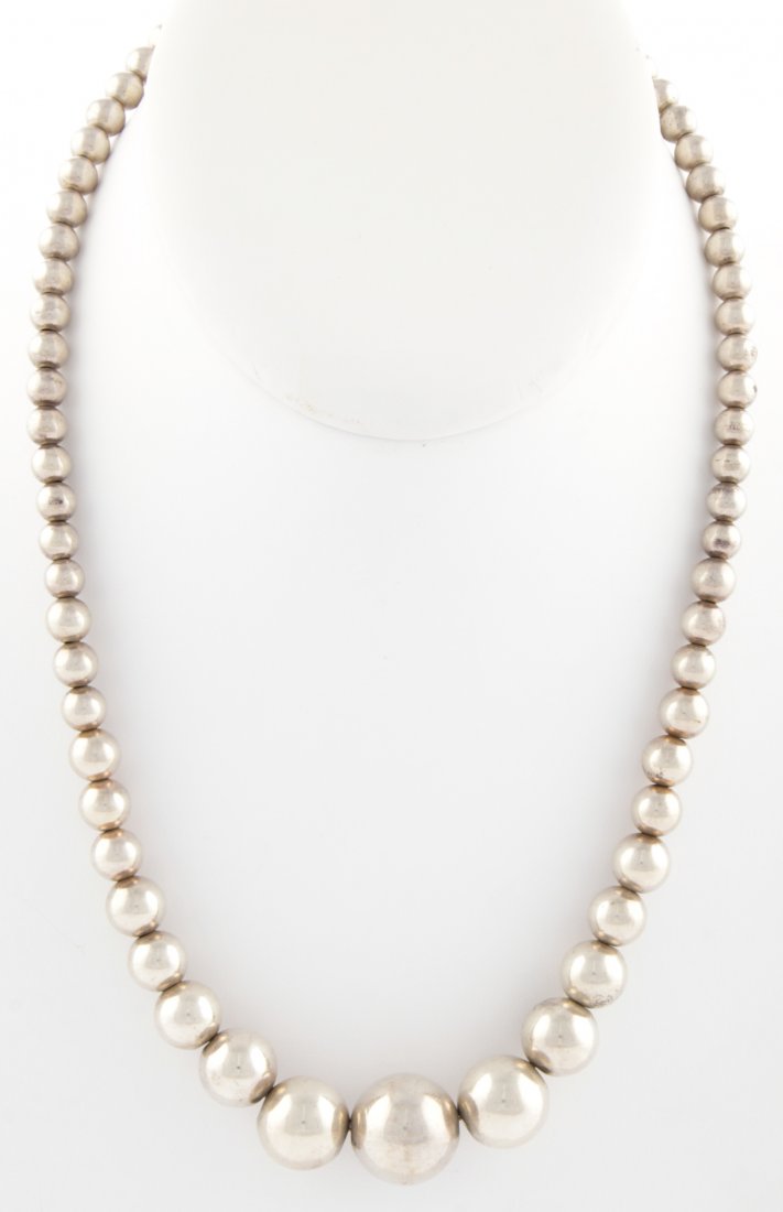 Sterling Silver Beaded Necklace marked 925: Sterling Silver Beaded Necklace marked 925. 18"L (46 cm). 29.8 g. Since 1937, the The Silver Shop of Princeton, NJ was located at 59 Palmer Square West.
