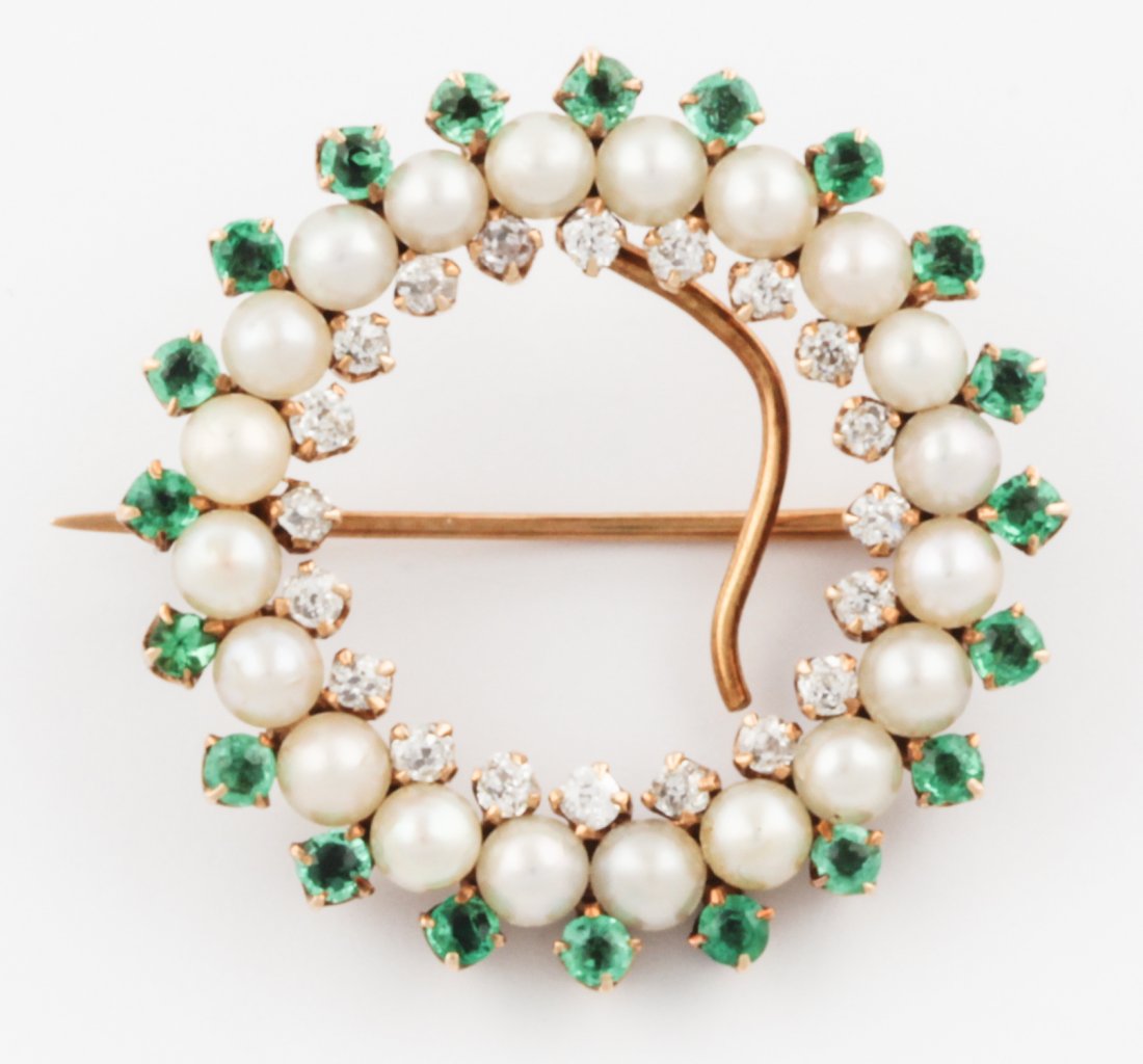 14 K. Gold, Emerald, Pearl and Diamond Circle Pin: Gold, Emerald, Pearl and Diamond Circle Pin. Loaded. Marked 14K. 1"D (2.5 cm). 4 g. Since 1937, the The Silver Shop of Princeton, NJ was located at 59 Palmer Square West.