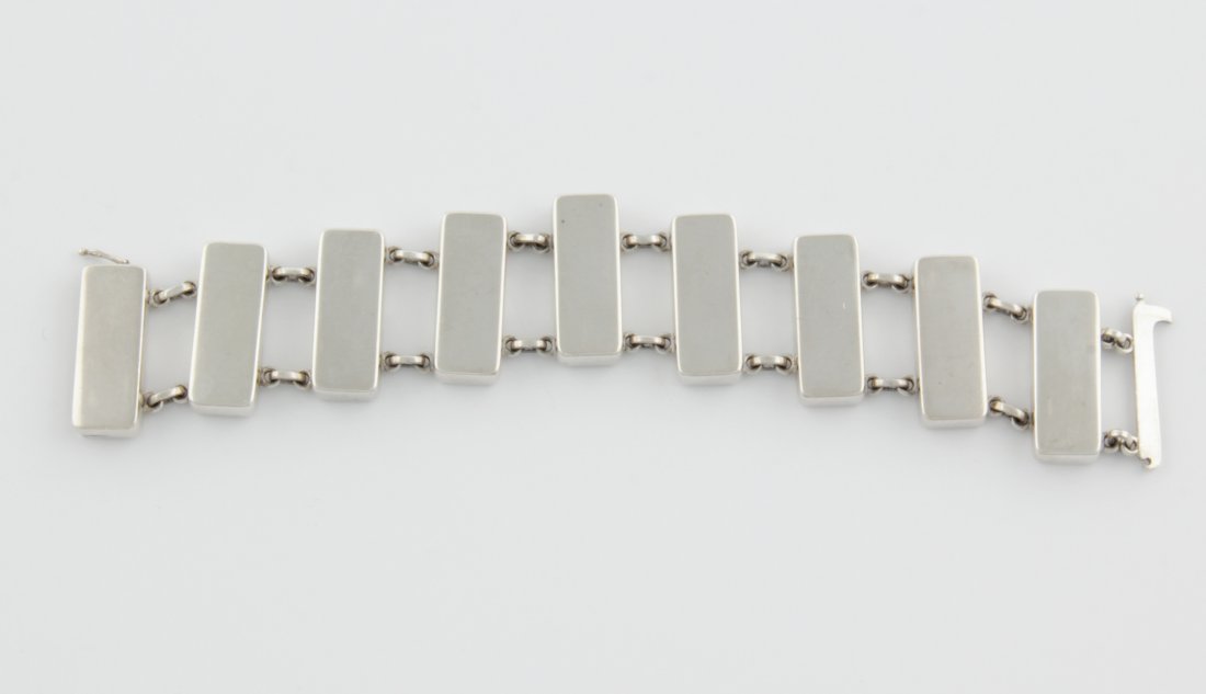 Georg Jensen Silver Bracelet: Georg Jensen Silver Bracelet. Hidden Clasp. Marked 925. 8"L (20 cm). 82.7 g.Since 1937, the The Silver Shop of Princeton, NJ was located at 59 Palmer Square West.