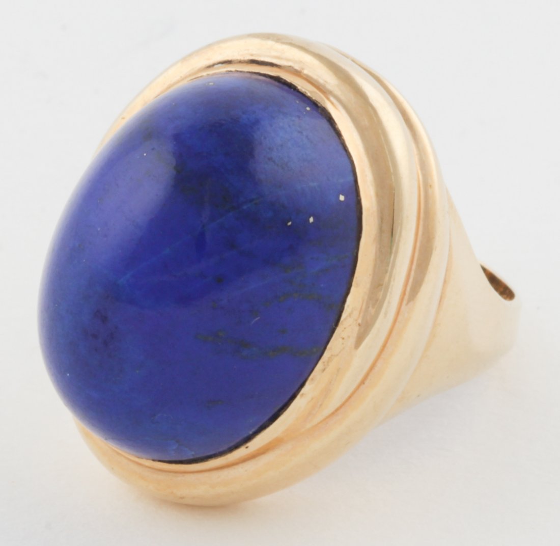 14K Gold and Lapis Ring: 14K Gold and Lapis Ring. Huge polished Lapis Oval bezel-set in Yellow Gold. Size 9. 20.2 g. Since 1937, the The Silver Shop of Princeton, NJ was located at 59 Palmer Square West.